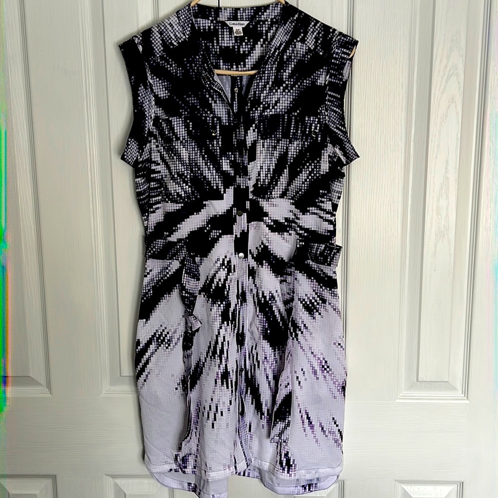 New w/o tags Sz Sm CK shirt dress with pockets and belt. 100% polyester